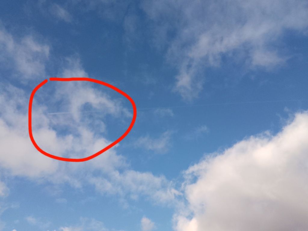 The aircraft drawing a line in the sky 